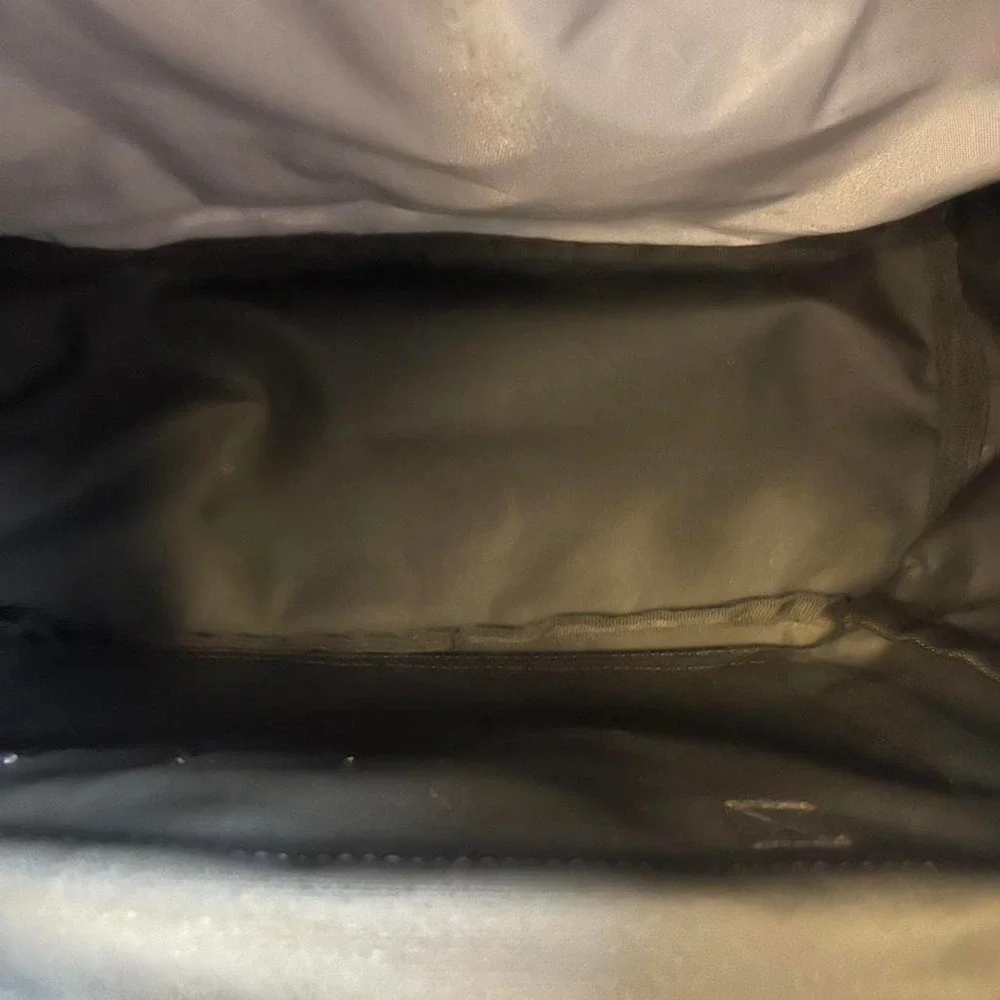 Black Carhartt canvas WIP backpack with bottle holder/ pocket